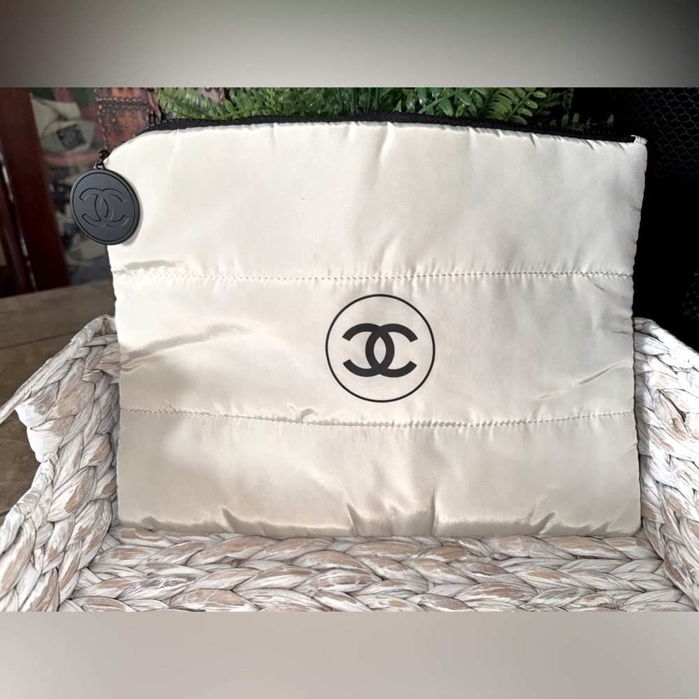 Brand New Chanel Off White Quilted Pouch with Black Logo